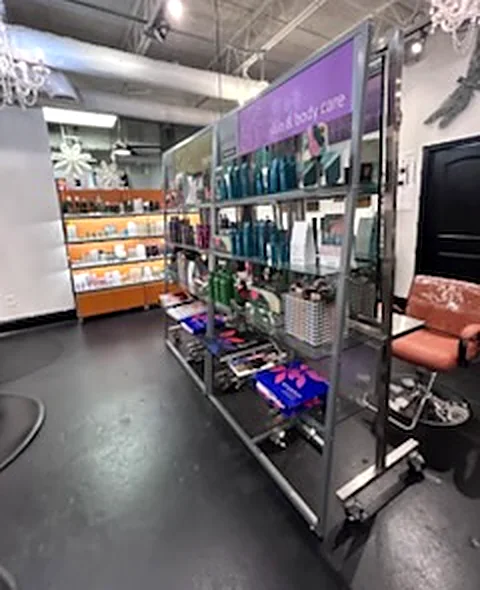 Aveda retail product display inside Aqua Aveda Salon & Spa